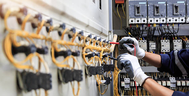 Professional Electrician technician working in Queens Gate, PA